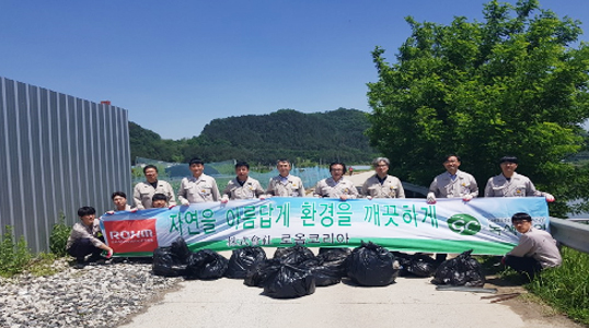 Cleaning Up the River Around the Company