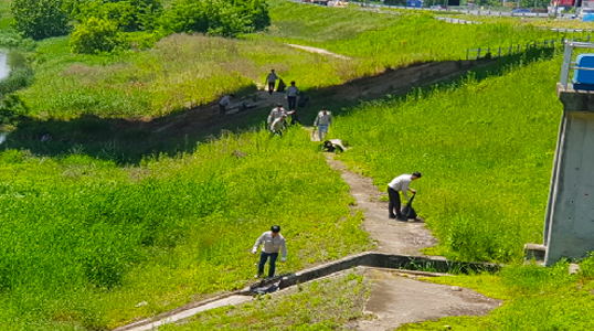 Cleaning Up the River Around the Company
